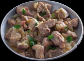 Cerdo salteado con cebolla pochada